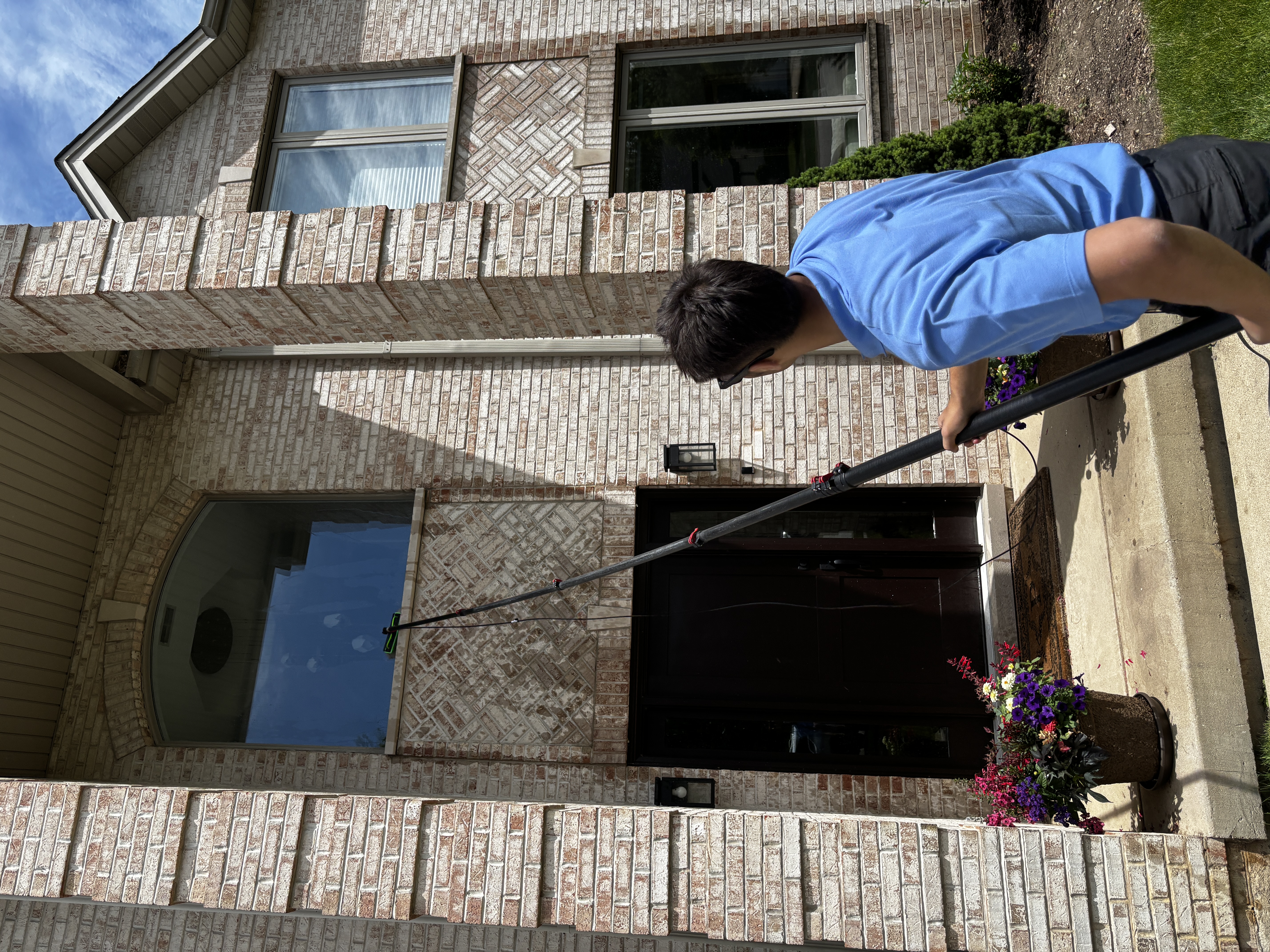 Exterior window cleaning with water-fed pole